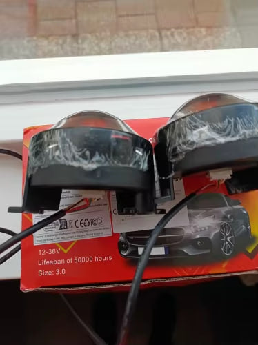 Two lenses still in bubble wrap sitting on the retail box after delivery - customer photo