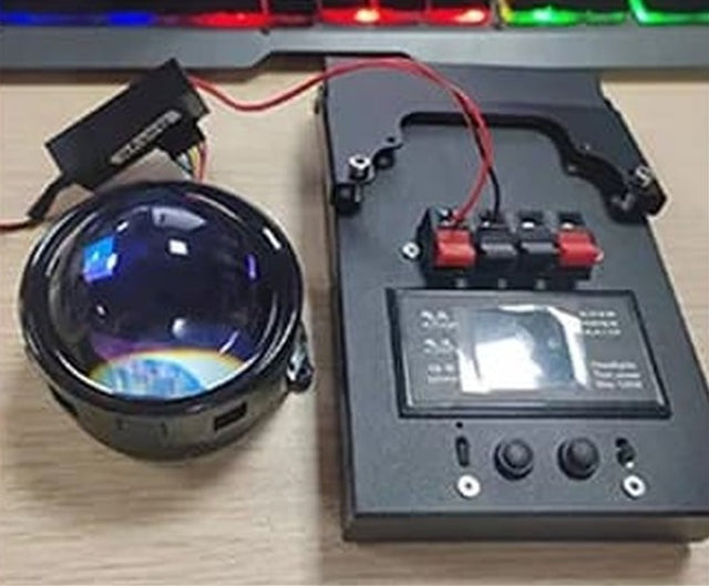 Devil eye lens connected to a 12V bench power supply, red to plus and black to minus